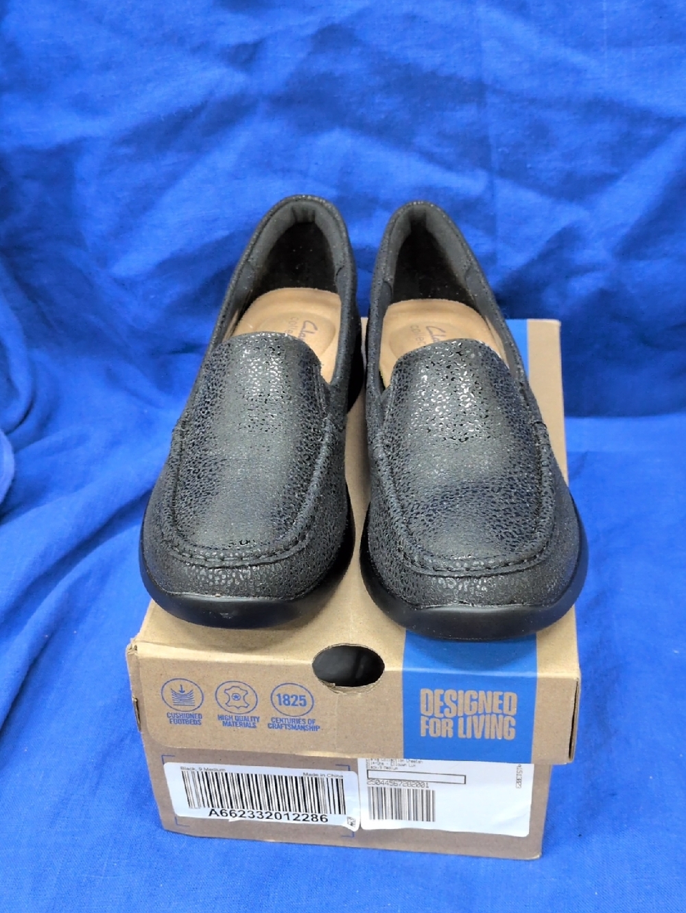 Clarks Black Slip-On Loafer with Cushioned Sole Elliyn Lux Cheetah